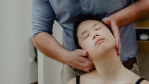 Neck adjustments with chiropractic singapore