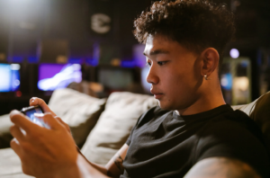 Young Asian Teen Playing Poki Games