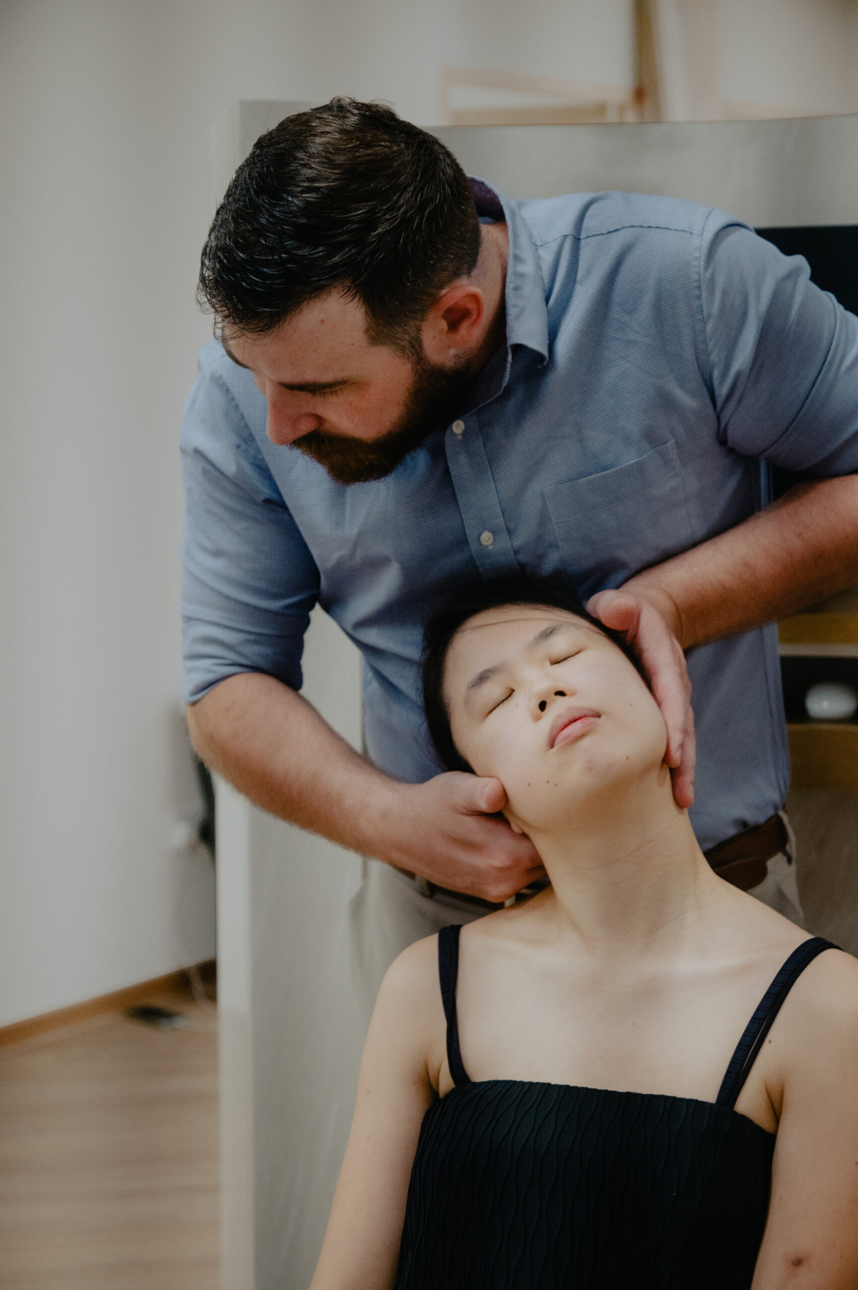 Woman getting neck adjustment