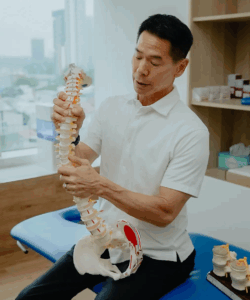 Chiropractor with Spine Model