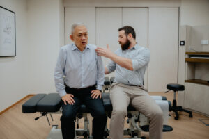 Asian man with Chiropractor