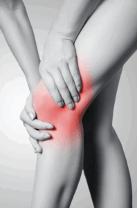 Woman experiencing an inflamed knee