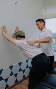 Chiropractor with his patient