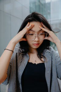 Woman suffering from headache