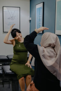 Chiropractor giving exercise tips