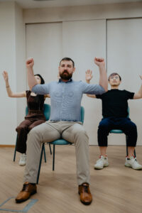 What posture correction exercises can support therapy?